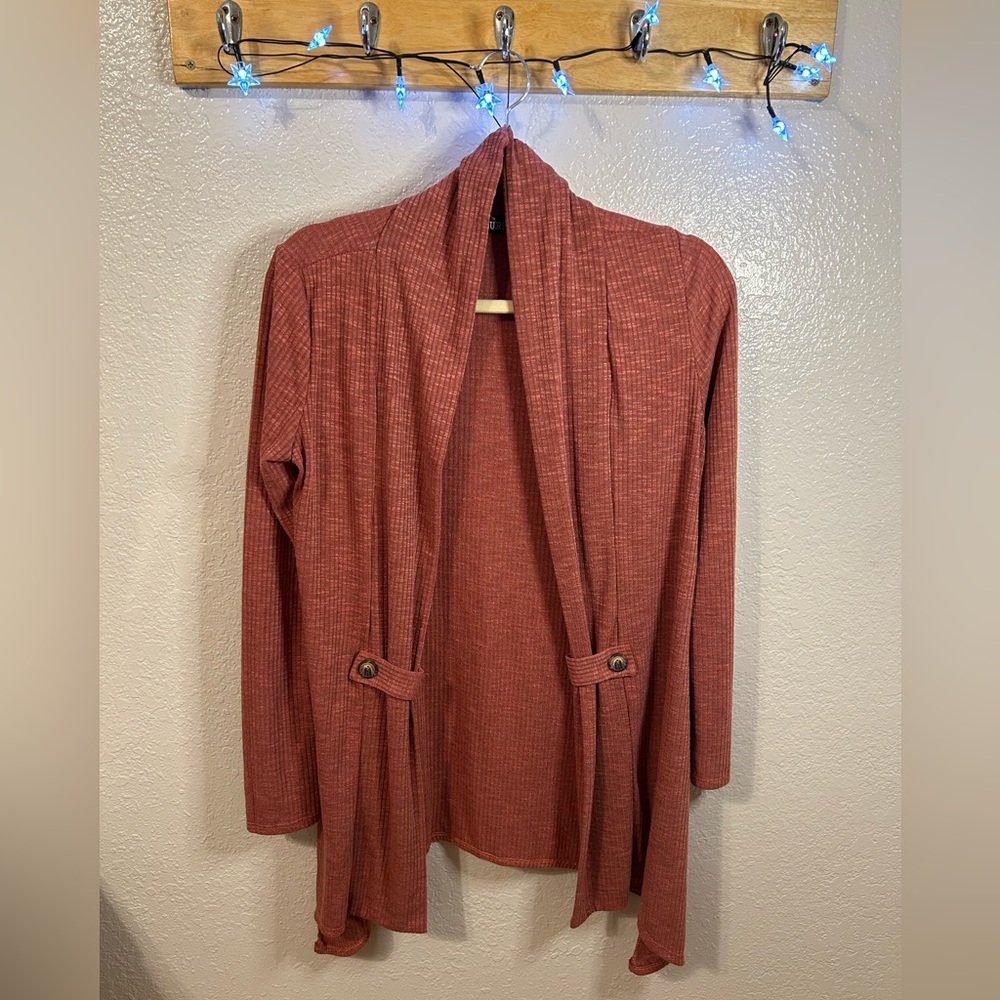 NWOT- perfect condition. Light weight cardigan.